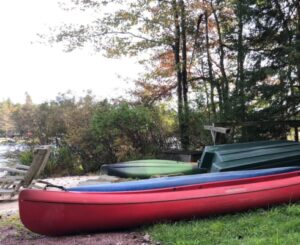 canoe, rowboat & 3 kayaks