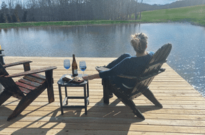 Enjoy a glass of wine on the sundeck overlooking the pond.