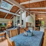 The upper floor living area,, dining room and kitchen at Lakeside on Lake Naomi Pocono Pines PA