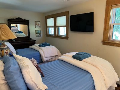 2nd floor twins bedroom with large streaming TV